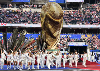 Celebrities including Halle Berry, Rob Lowe and Paris Hilton watched on as performers danced around a giant World Cup trophy