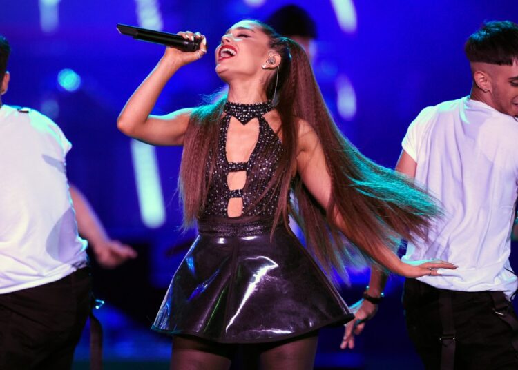 Ariana Grande highlights latest album at sold-out concert tour opener