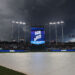 KANSAS CITY, MO - JULY 11: Dark clouds fill the skies as the scoreboard shows a rain delay before an MLB game between the New York Mets and Kansas City Royals on July 11, 2025 at Kauffman Stadium in Kansas City, MO. (Photo by Scott Winters/Icon Sportswire via Getty Images)