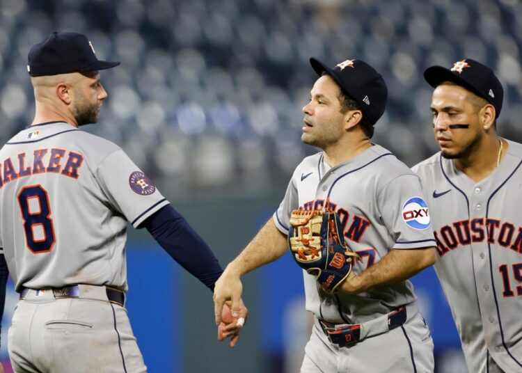 Astros rally past Royals 8-7 after Altuve ties it and a ninth-inning miscue