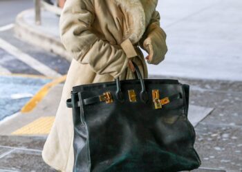 Bianca Censori was spotted departing Melbourne International Airport after an emotional farewell with family.