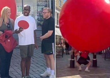 Celebrities Struggle to Roll Giant Red Ball Through Canterbury for New TV Show