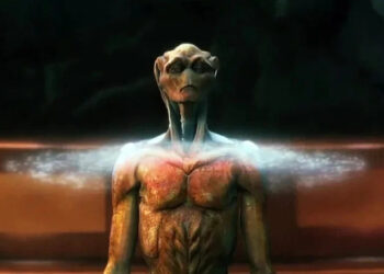 An alien standing in a ring of light in The Arrival