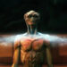 An alien standing in a ring of light in The Arrival