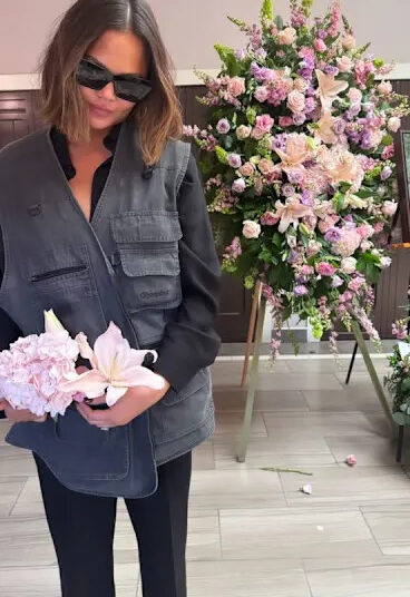 Teigen wears her dad's vestCredit: Chrissy Teigen/Instagram