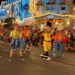 Performers and a character in costume dance during Magic Kingdom’s 2025 Mickey's Boo to You Halloween Parade at night.