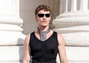 Did Connor Storrie manifest his Saint Laurent front row seat next to Madonna?