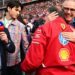 A man walks through the F1 grid.