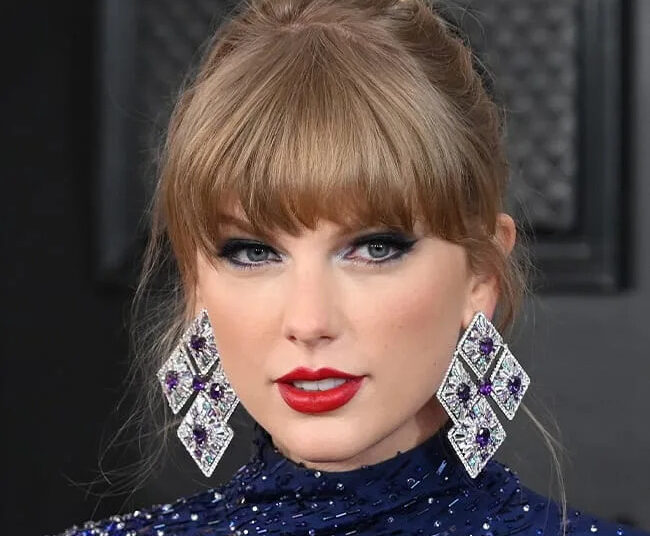 Fans React To Taylor Swift's Spray Tan Mishap At The 'Toy Story 5' Premiere