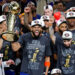 Karl-Anthony Towns #32 of the New York Knicks celebrates with the Larry O'Brien Championship Trophy after the victory against the San Antonio Spurs in Game Five of the 2026 NBA Finals at Frost Bank Center on June 13, 2026 in San Antonio, Texas.