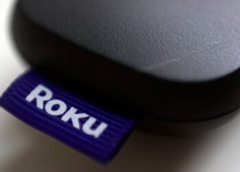 This Aug. 13, 2020, file photo shows a logo for Roku on a remote control in Portland, Ore. (AP Photo/Jenny Kane, file)