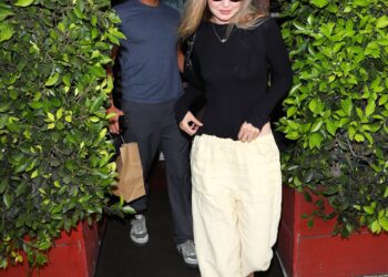 Gigi Hadid wore the butter yellow color trend on a date with Bradley Cooper