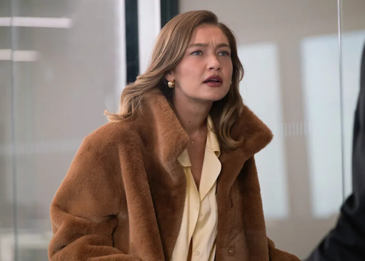 Gigi Hadid plays Bill's (Jay Ellis') girlfriend in Hulu's "Not Suitable For Work."