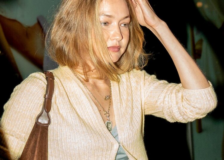 Gigi Hadid's Bradley Cooper Gold Dog Tag Necklace: Cost & More Details