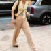 Gigi Hadid styled the butter yellow color trend to make her cardigan a chic summer sweater