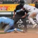 Chicago White Sox' Luisangel Acuña (0) is safe at second base as Kansas City Royals second baseman Tyler Tolbert (2) can't handle an errant throw during the seventh inning of a baseball gam,e Saturday, June 27, 2026, in Chicago. (AP Photo/David Banks)