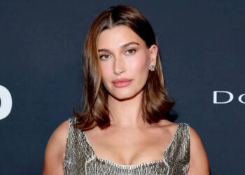 Hailey Bieber Shows Off New Rib Tattoo That's Seemingly in Honor of 21-Month-Old Son Jack Blues