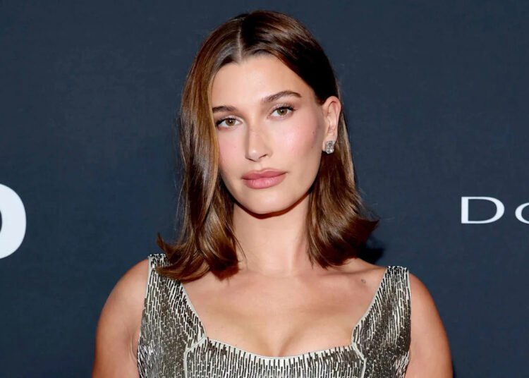 Hailey Bieber Shows Off New Rib Tattoo That's Seemingly in Honor of 21-Month-Old Son Jack Blues