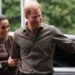 The Duke and Duchess of Sussex wave at the crowd after arriving at an event in Melbourne, Australia on 14 April 2026.