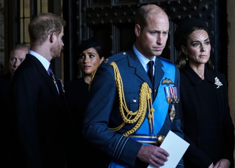 Britain's Prince William, Kate, Princess of Wales, Prince Harry, and Meghan, Duchess of Sussex, pay their respects to Queen Elizabeth II in Westminster Hall for the Lying-in State, in London, Wednesday, Sept. 14, 2022.