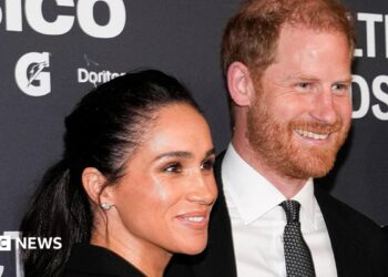 Duchess and Duke of Sussex, head and shoulders, in a pic in New York