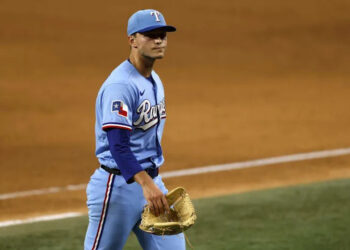 Jack Leiter #22 of the Texas Rangers looks toward the crowd after being relieved during the sixth inning against the Kansas City Royals at Globe Life Field on May 31, 2026 in Arlington, Texas.