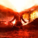 A superhero, likely Cyclops, emits a powerful red energy beam from his eyes amidst a fiery, chaotic background.