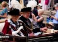 King Charles III and Queen Camilla in a carriage after attending the annual Order of the Garter Service at St George's Chapel, Windsor Castle on 15 June 2026.