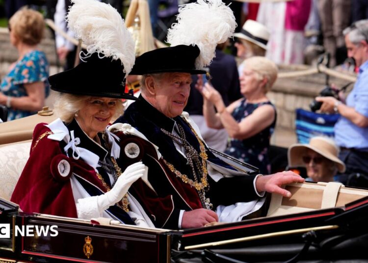 King Charles III and Queen Camilla in a carriage after attending the annual Order of the Garter Service at St George's Chapel, Windsor Castle on 15 June 2026.
