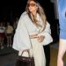 Jennifer Lopez wears parachute pants and a matching shirt and carries a rare Hermes Kelly Bag to attend Ariana Grande's Eternal Sunshine Tour