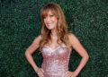 Jane Seymour posing on red carpet in gold sequined dress at Dolby Theatre