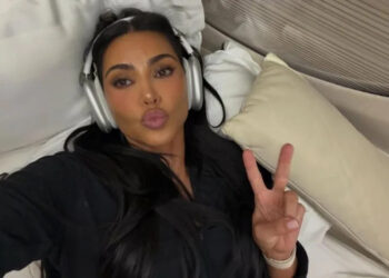 Kim Kardashian Nearly Spills Out of a String Bikini That's Hanging on by Threads
