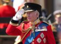 Britain's King Charles III salutes the troops outside Buckingham Palace during Trooping The Colour, the King's annual birthday parade, in London, Saturday, June 13, 2026.