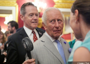 King Charles' priceless reaction as senior aide rushes to cool him during record heat