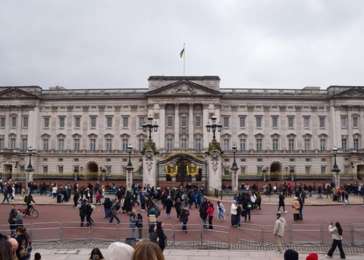 General view of Buckingham Palace with tourists gathering outside on February 19, 2026.
