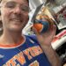 Kosha Dillz with a Knicks-themed bagel (courtesy of Kosha Dillz)