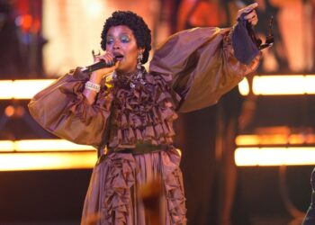 Lauryn Hill accepts the living legend icon award during the BET Awards on Sunday at the Peacock Theater in Los Angeles. (AP Photo/John Locher)