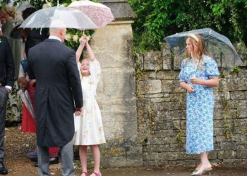 Mike Tindall with Mia and Lena Tindall at the wedding of Harriet Sperling to Peter Phillips at All Saints Church
