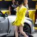 Lily Collins pulled off a neon green and purple color combination at the Formula 1 Monaco Grand Prix