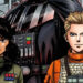 Thane Kyrell and Ciena Ree with Darth Vader in the background on the cover for the Star Wars: Lost Stars manga