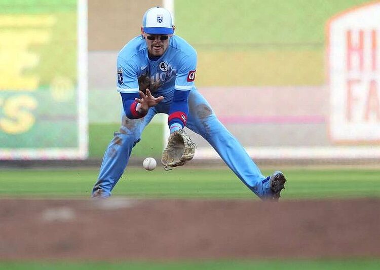 Kansas City Royals shortstop Bobby Witt Jr. fields a ground ball during the first inning of a baseball game against the Cincinnati Reds, Tuesday, June 2, 2026, in Cincinnati. (AP Photo/Kareem Elgazzar)