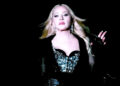 Madonna Strikes a Sultry Pose in a Deep-Plunging Nude Corset