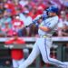 Massey hits tiebreaking RBI single in 9th inning, Royals beat Reds 5-2