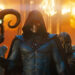 Skeletor holding his Havoc Staff as buildings burn behind him in Amazon's Masters of the Universe movie.