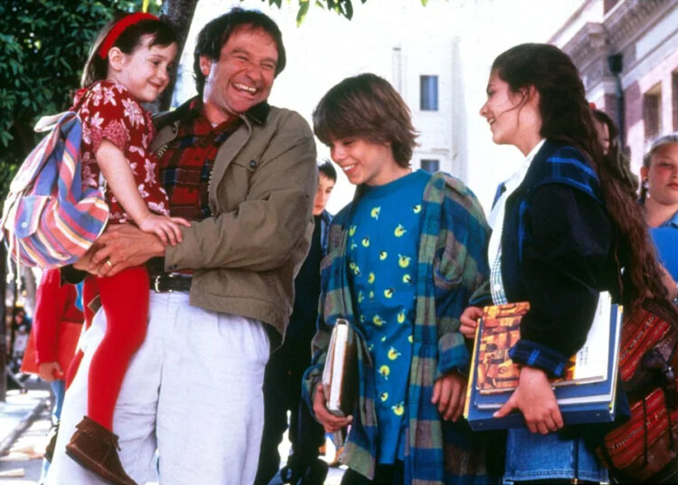 Mara Wilson, Robin Williams, Matthew Lawrence, and Lisa Jakub in 'Mrs. Doubtfire.'Credit: Moviestore/Shutterstock