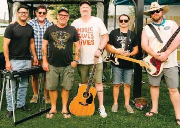 members of Vet Jams gather July in 2025 for a live show