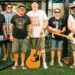 members of Vet Jams gather July in 2025 for a live show