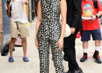 Nina Dobrev wears a Carolina Herrera Fall 2026 leopard-print two-piece set for The Daily Show in New York City.