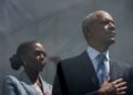 Former President Barack Obama and former First Lady Michelle Obama on stage during the dedication ceremony for the Obama Presidential Center, Thursday, June 18, 2026, in Chicago. (AP Photo/Alex Brandon)