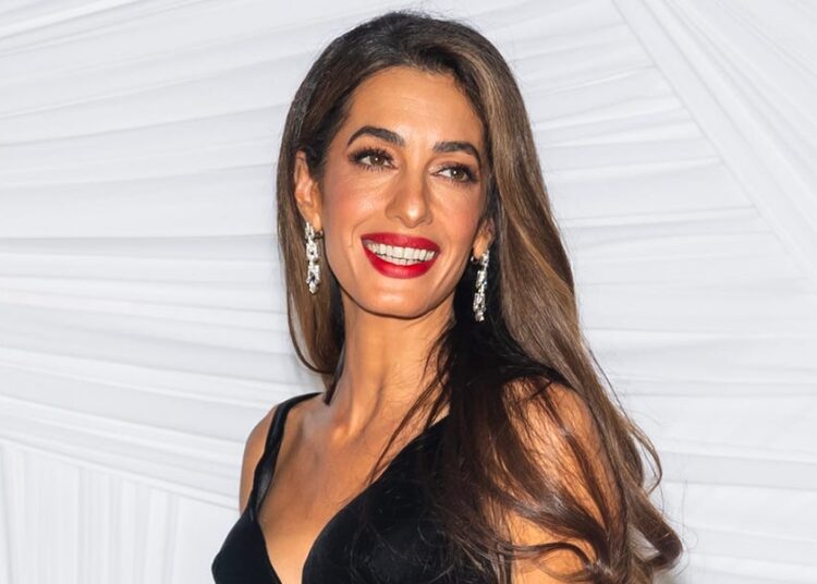 Only Amal Clooney Could Make Stirrup Pants Look This Good